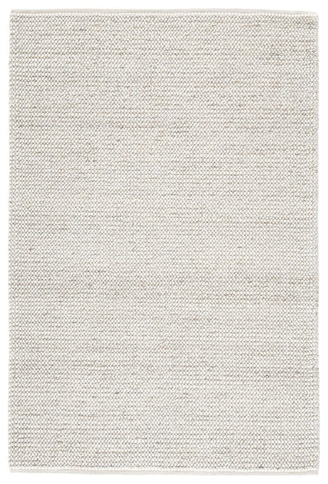 Close-up of Jossick rug's handwoven cream and taupe fibers