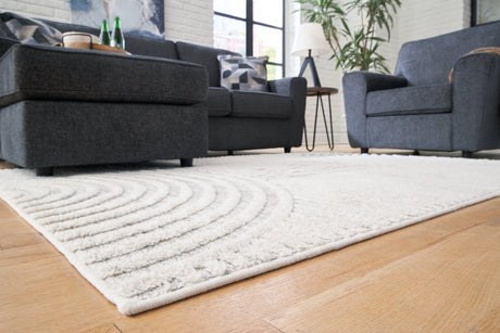 Close-up of Lambworth area rug geometric pattern in gray and cream