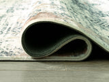 Rolled view of Redlings Multi 5' x 7' Rug showing pile and backing