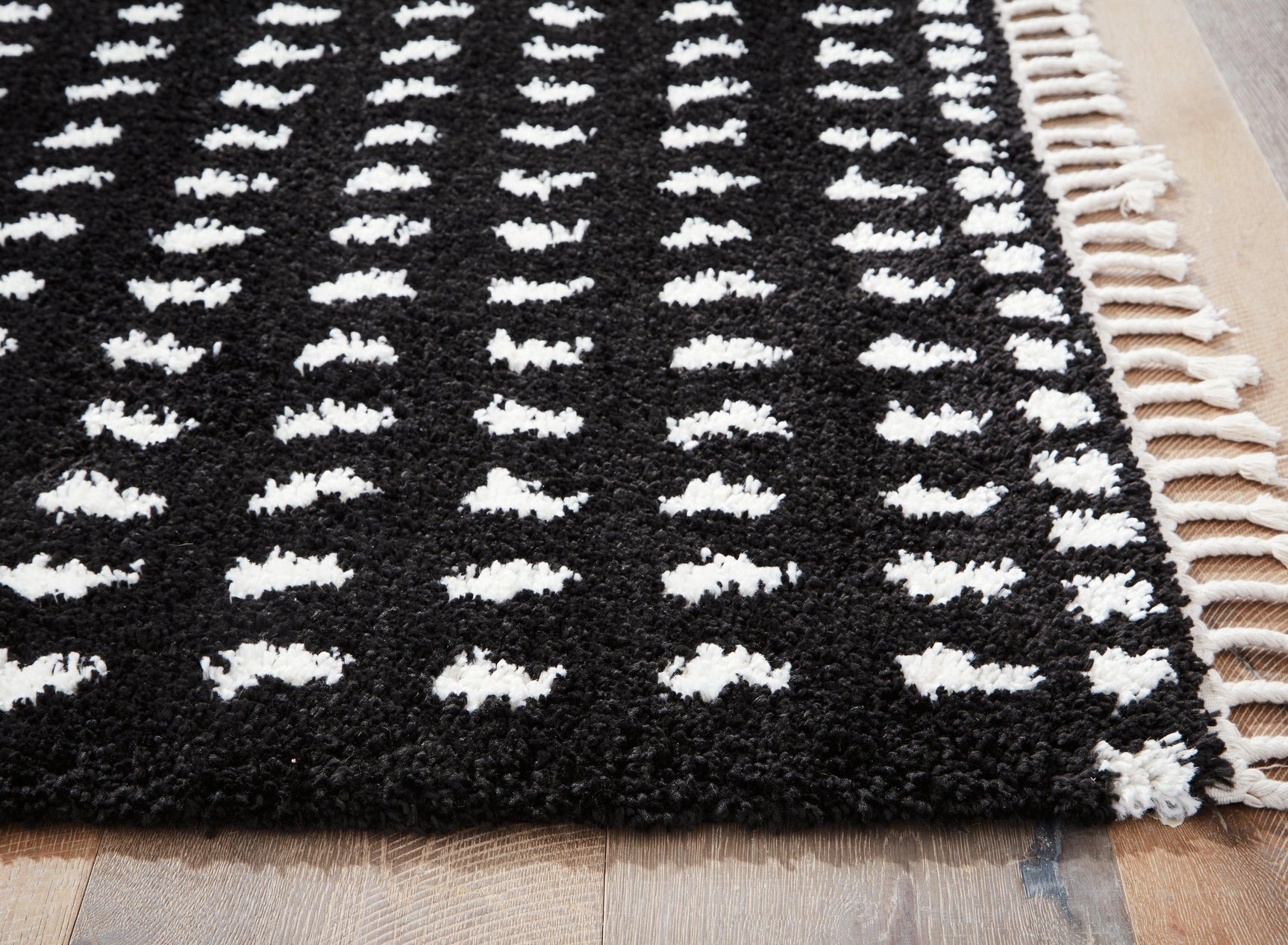 Detail of 3-inch braided tassel edge on Minston rug
