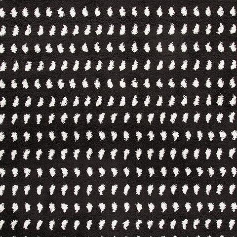 Swatch of Minston black and white area rug fabric