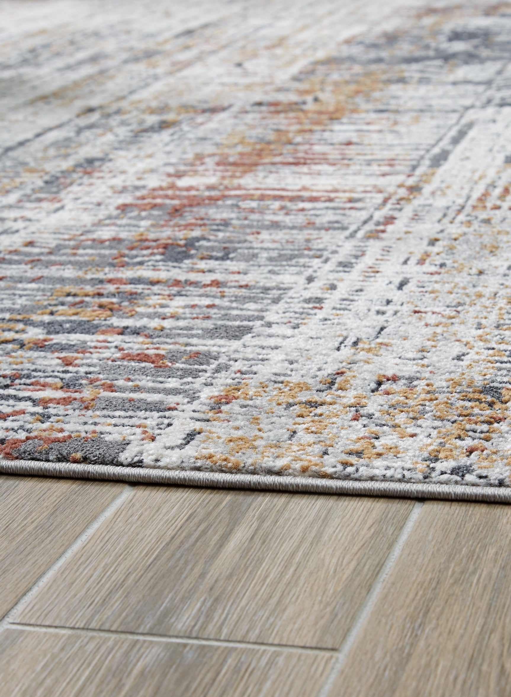 Side angle showing the rug pile height and jute backing