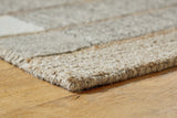 Close-up of Abbotton hand-tufted wool and jute fibers