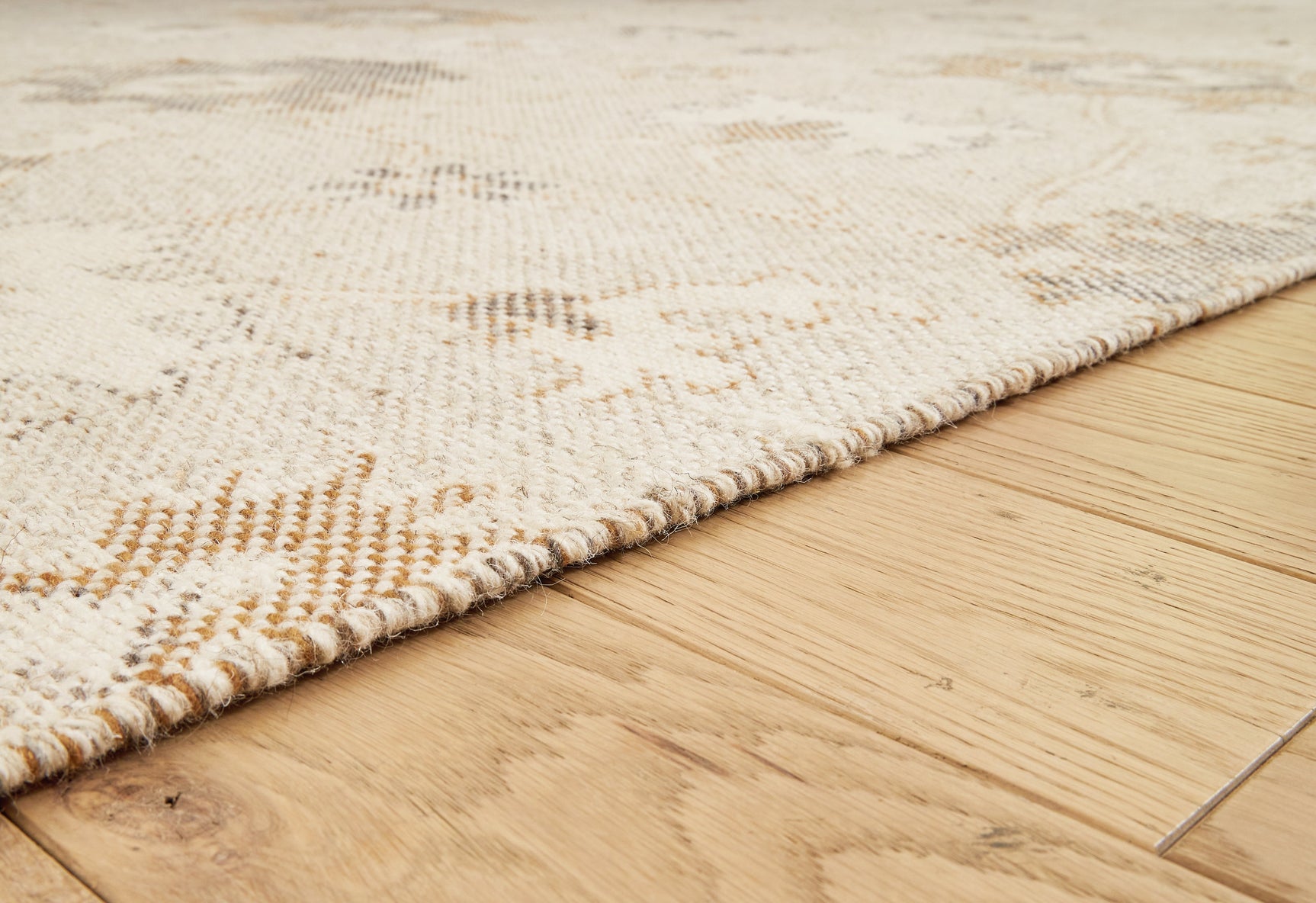 Detail of fringe edging on Calkin floral area rug