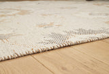 Close-up of Calkin linen gray caramel floral rug texture