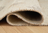 Detail of Calkin rolled linen gray caramel rug edge