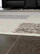 Barus rug folded showing texture and fabric