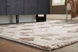 Rolled edge detail of Brettler beige brown rug