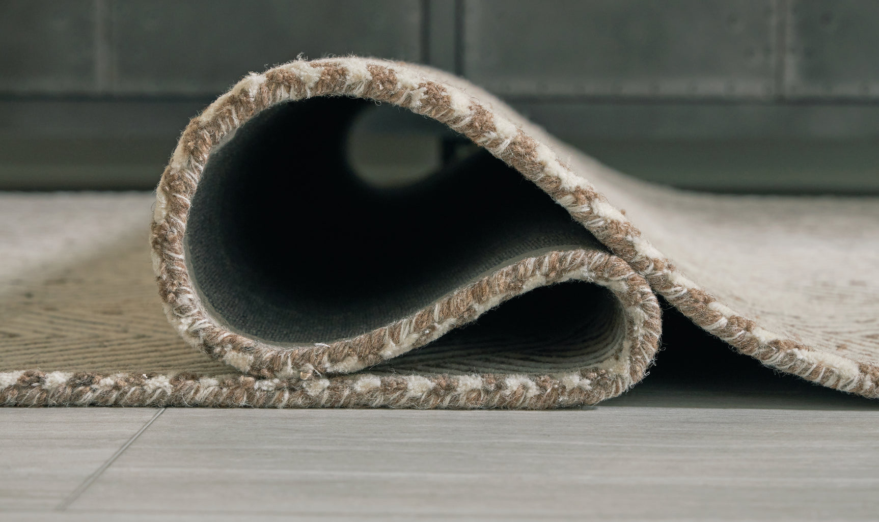 Rolled edge detail of Jadott Beige Brown Large Rug