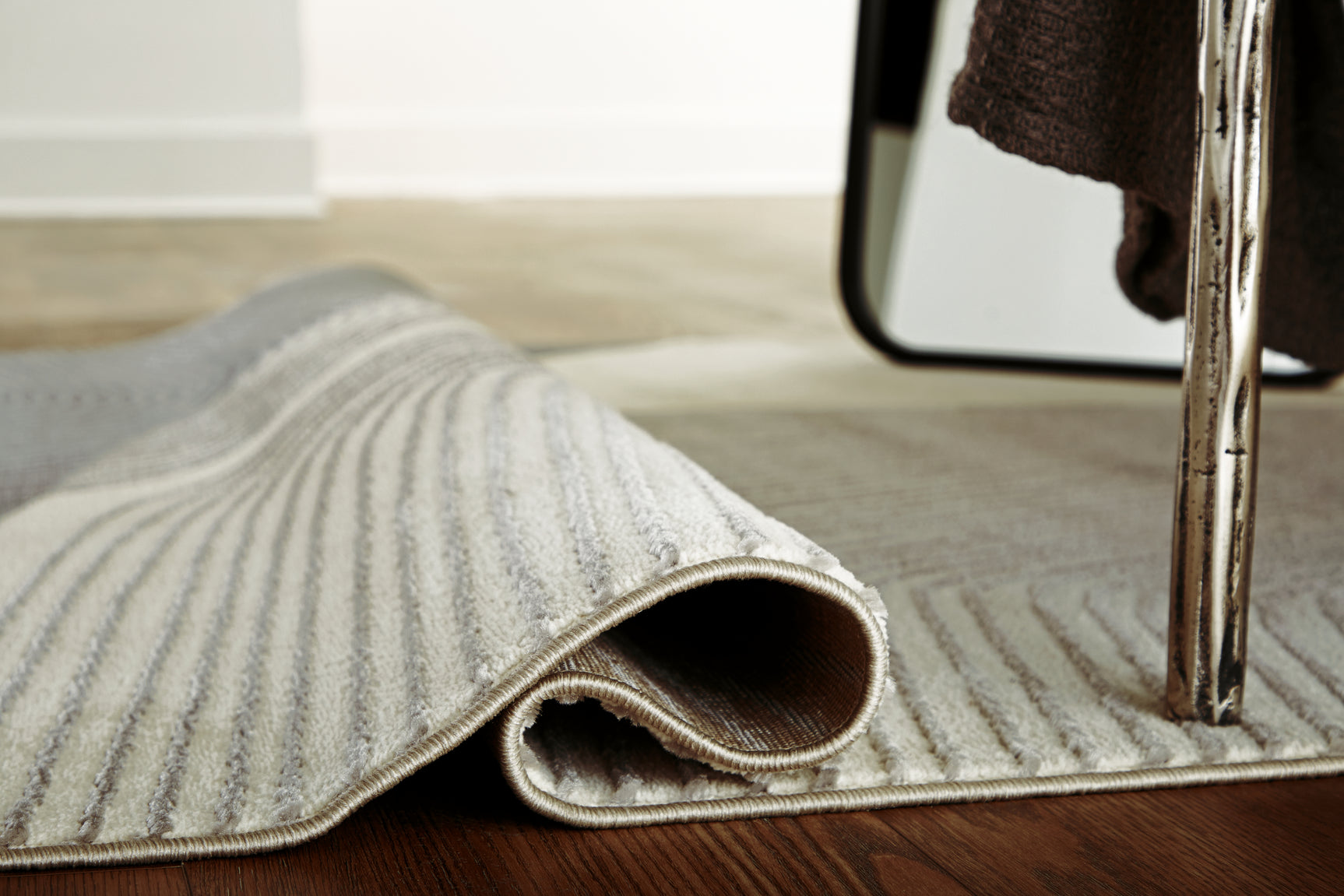 Winderburg rug sample swatch in gray and ivory colors