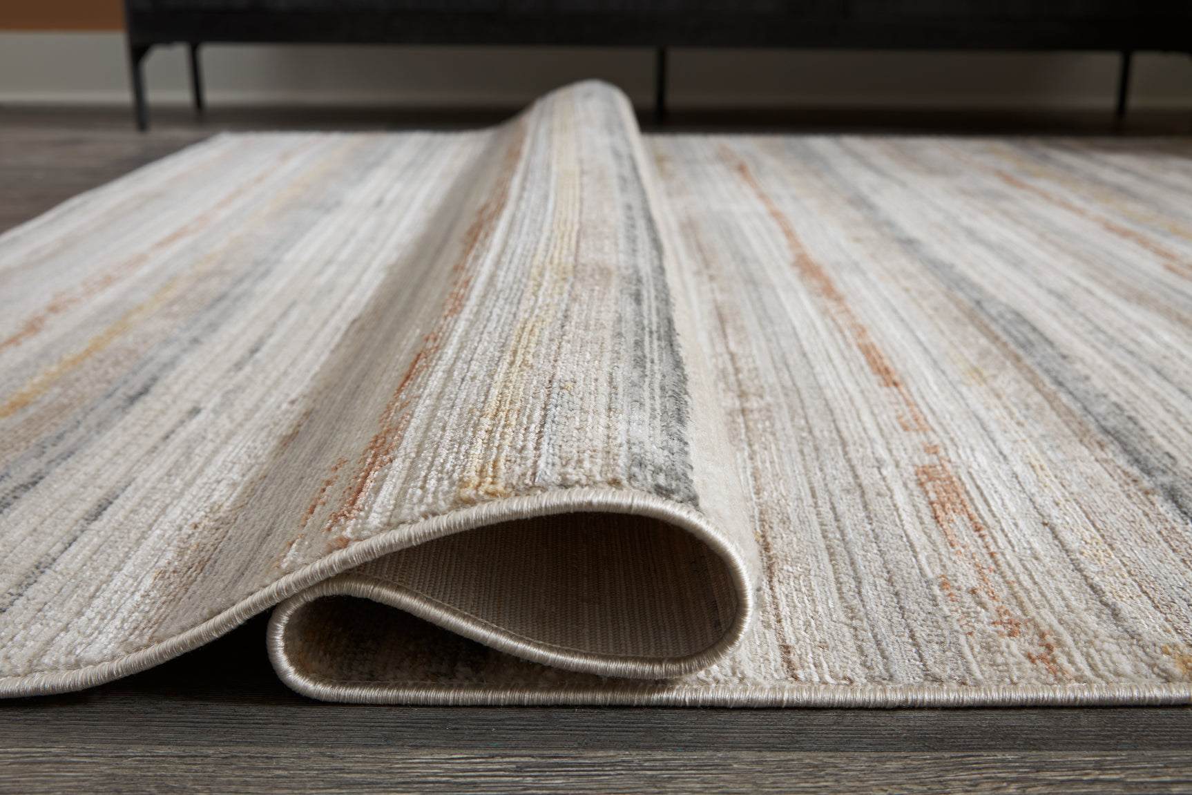 Side view showing thickness of Artney Medium Rug
