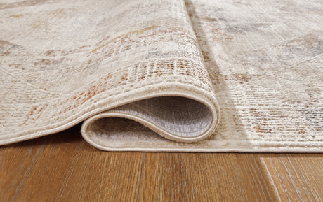 Rolled edge view of Varnwood multi medium area rug