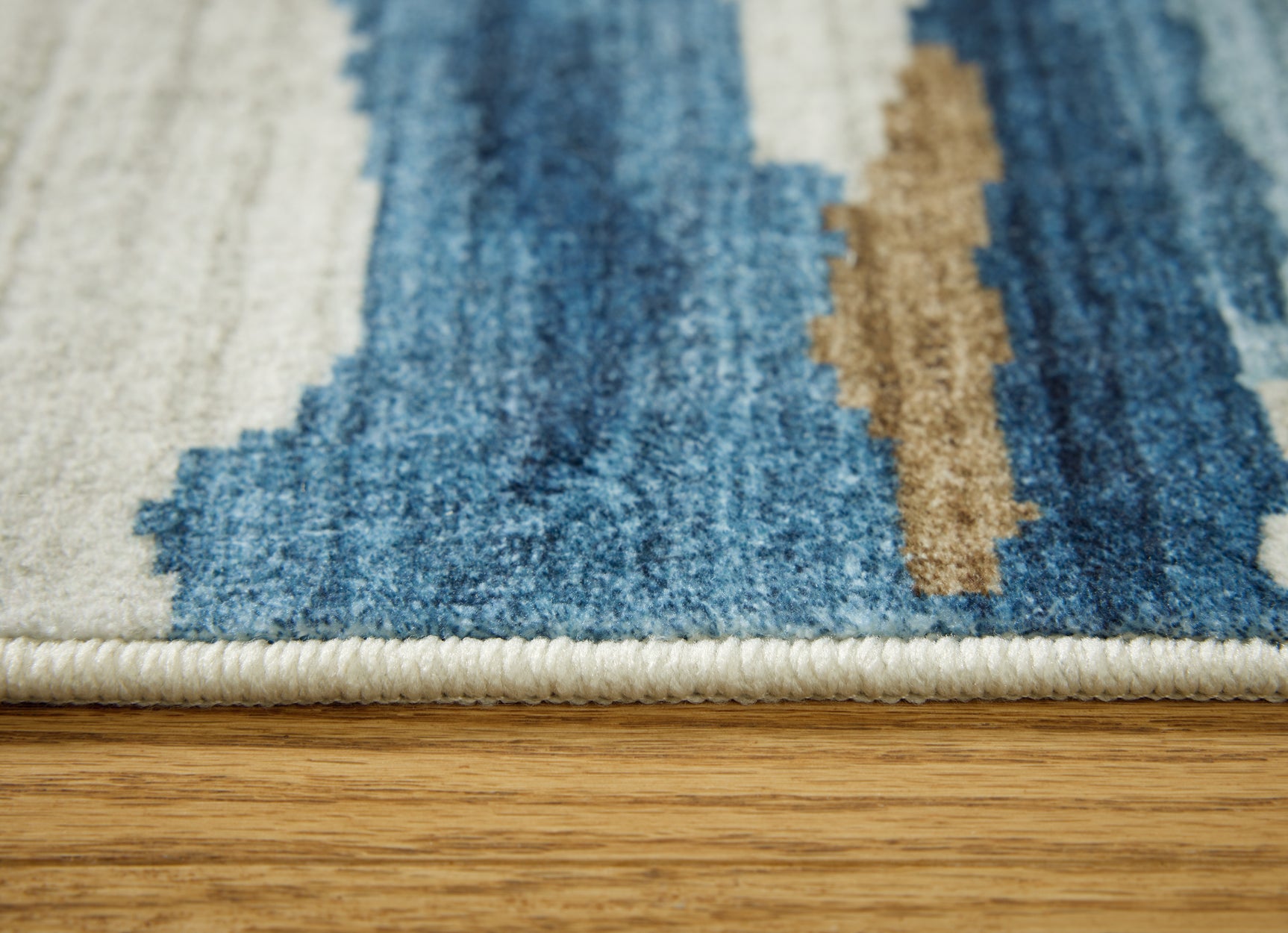 Vinlett Cream/Blue/Brown 5' x 7' Washable Rug