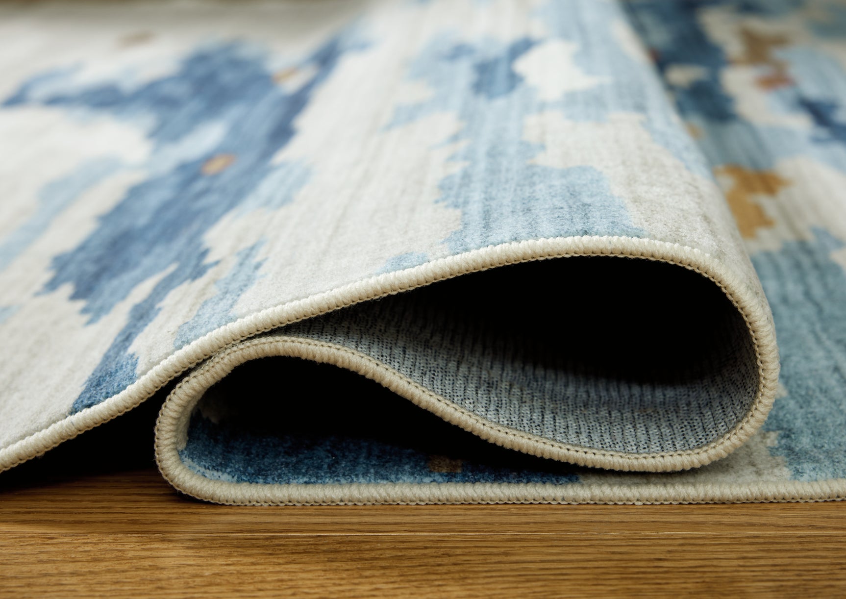 Vinlett Cream/Blue/Brown 5' x 7' Washable Rug
