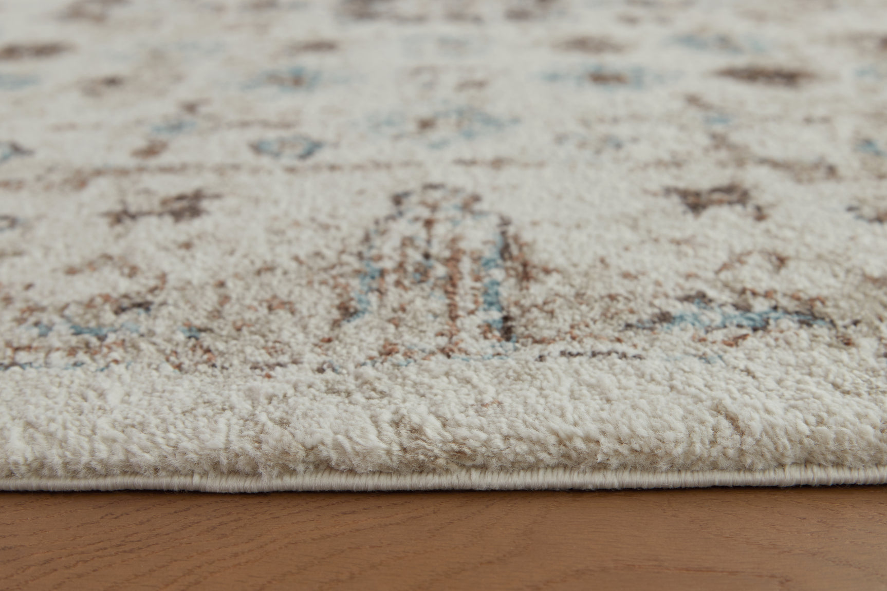 Close-up of floral medallion pattern on Jossler rug