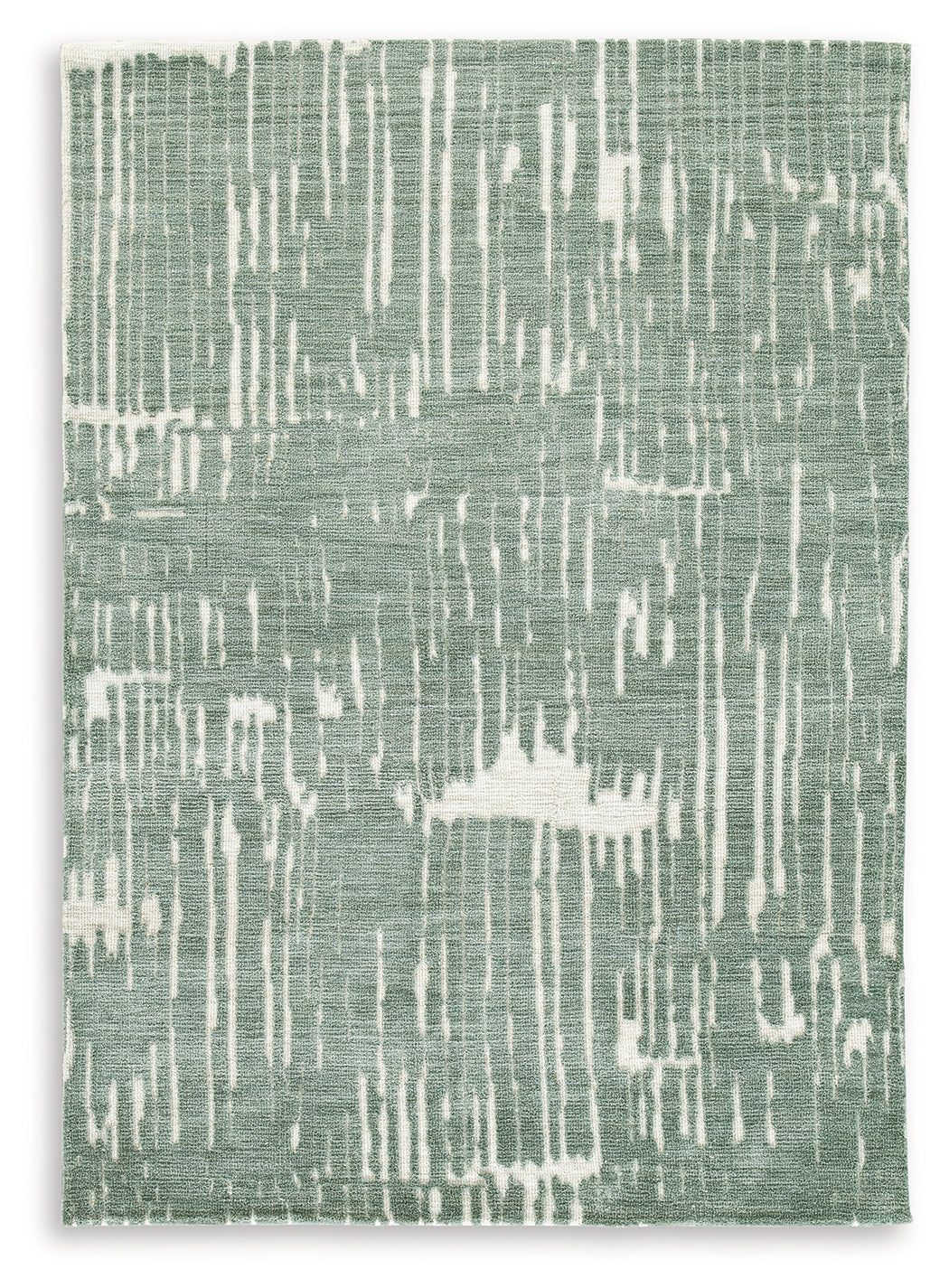 Rolled Cayworth teal white rug showing material texture