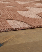 Rolled detail of Perrenton Clay hand-tufted rug