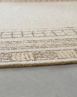 Hand-tufted wool and jute fibers detail