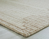 Rolled view showing texture and wool material of Emorymore rug