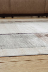 Larkport rug rolled showing backing material