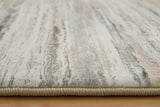 Side view showing memory foam thickness of Nace Area Rug
