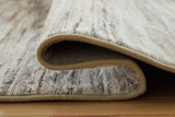 Rolled Nace Memory Foam Area Rug with visible pile