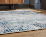 Arlenmont Blue/White/Brown 7'6" X 9'6" Memory Foam Area Rug