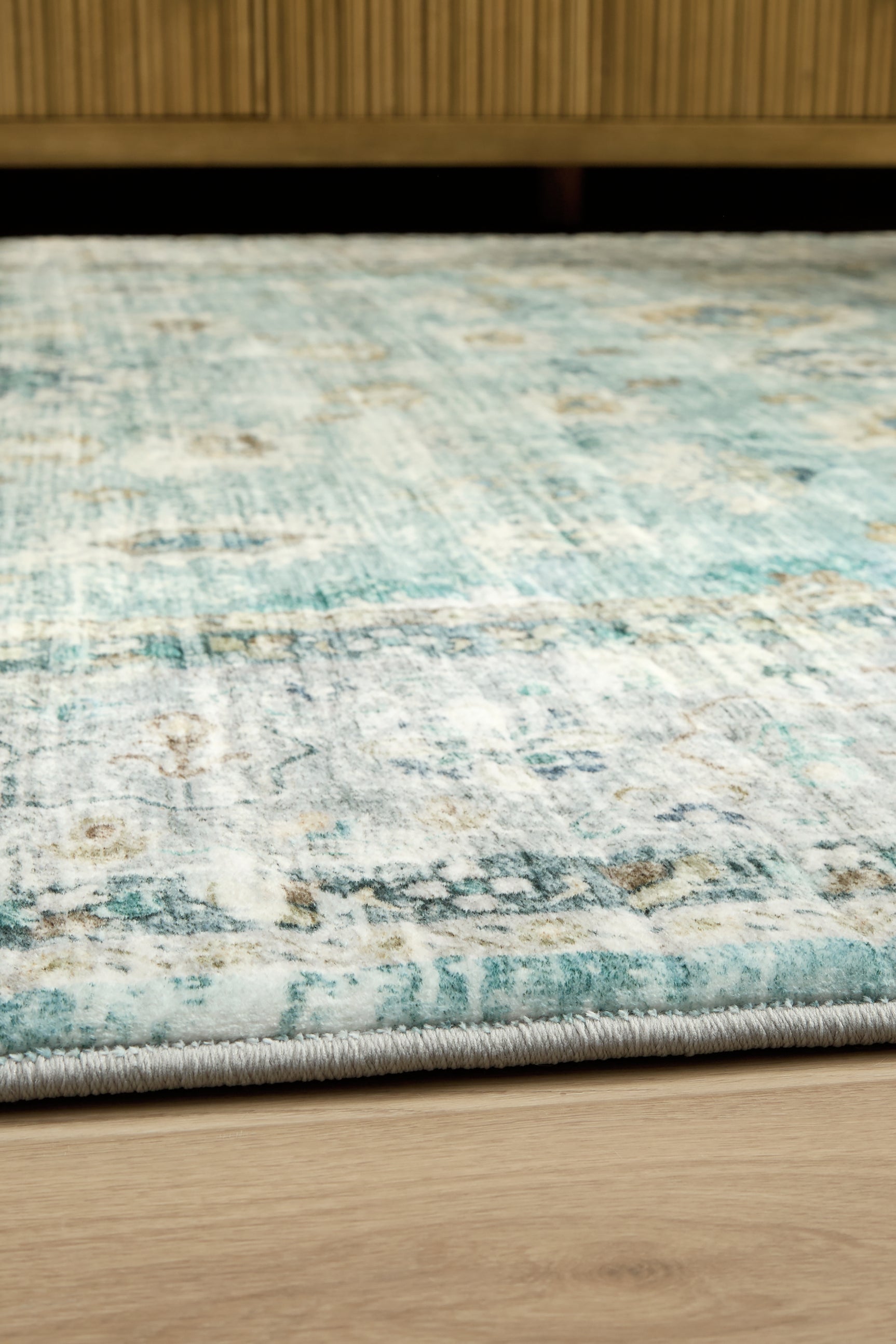 Rolled edge detail of Ladstoney memory foam area rug