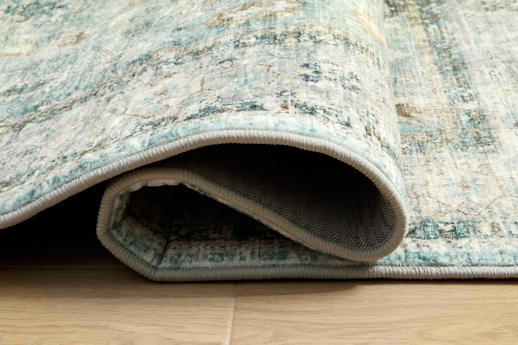 Rolled Ladstoney memory foam area rug view