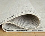 Fabric swatch detail of Turinwith area rug in ivory and black
