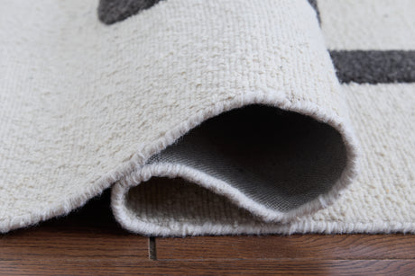Hand tufted abstract pattern in ivory taupe charcoal colors