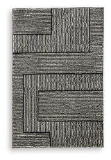 Kurtmen area rug corner detail showing texture