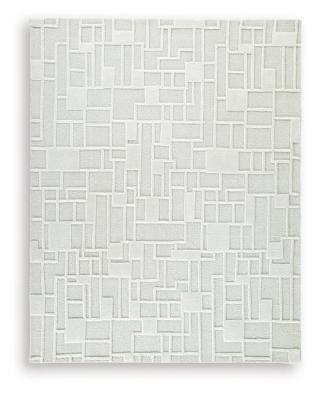 Close-up of Empriss Ivory rug tufted high-low pile texture