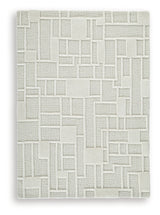 Rolled Empriss Ivory 5x7 area rug showing edge details