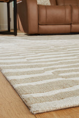 Roll detail showing edge and pile of Corrbell area rug
