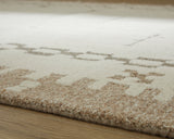 Folded corner showing wool pile and cotton backing of Dot rug