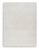Wolbert rug rolled to show the texture and pile