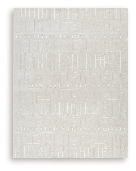 Wolbert rug rolled to show the texture and pile