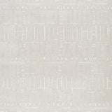 Wolbert rug color swatch showing tan and ivory hues