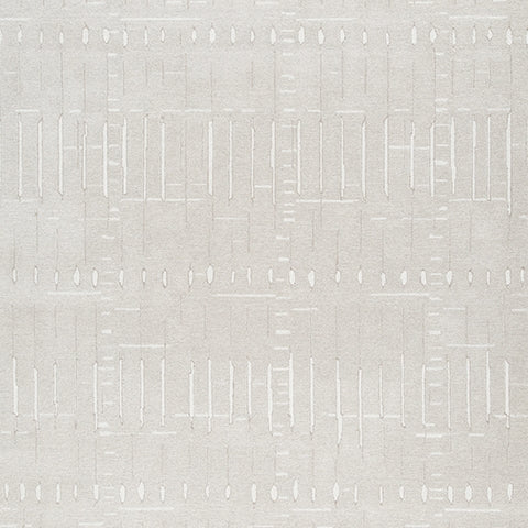 Wolbert rug color swatch showing tan and ivory hues