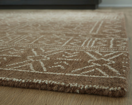 Rolled Merrittman area rug showing pile texture