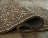Merrittman area rug showing edge and backing