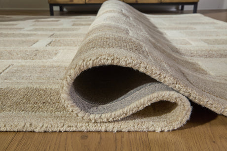 Rolled Lisgrove rug showing hand-tufted weave