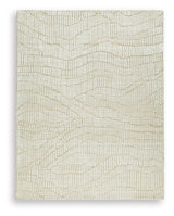Close-up detail of Jaseena beige and tan area rug texture