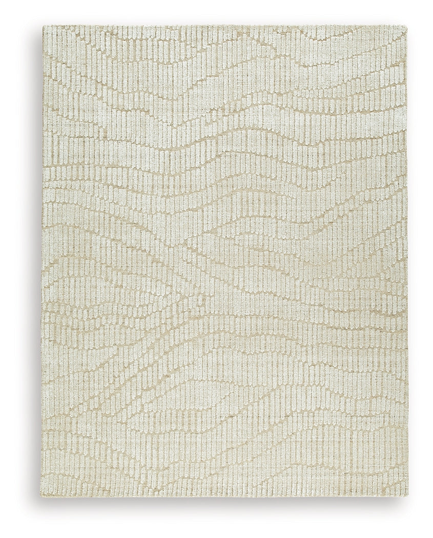 Close-up detail of Jaseena beige and tan area rug texture