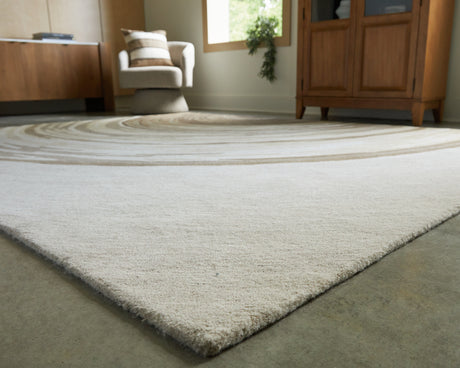 Close-up of abstract ripple pattern on Rizwana area rug