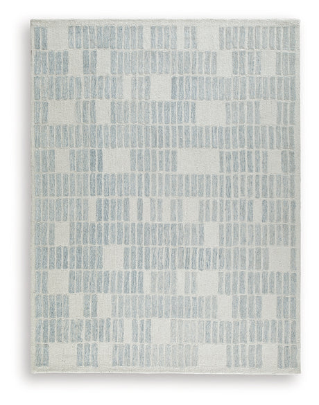Hand-tufted geometric pattern detail of Dylanton ivory and blue rug