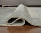 Rolled view of Dylanton 5x7 area rug