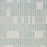 Color swatch of ivory and blue shades on rug