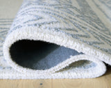 Texture detail of Azelhurst blue, ivory, gray rug pile